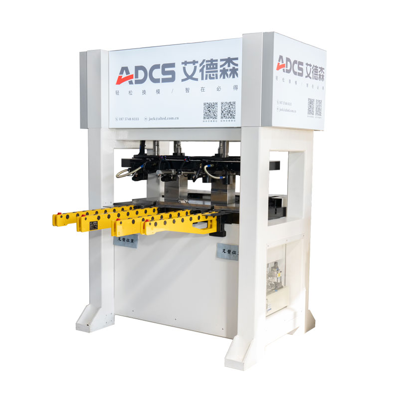 How does the Quick Die Change System improve safety?